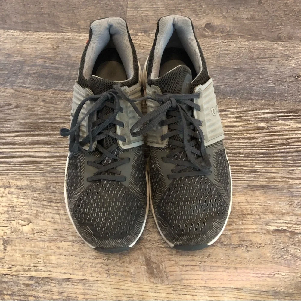 On cloud tennis shoes used condition. Has some holes,pictures& slits on bottom